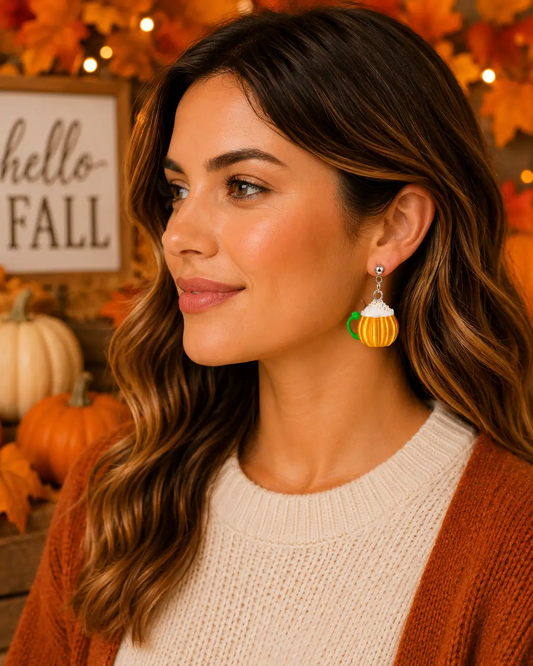 Virtual model wearing handmade pumpkin spice latte earrings featuring pumpkin coffee mugs, perfect for fall fashion, Thanksgiving, and coffee lovers.