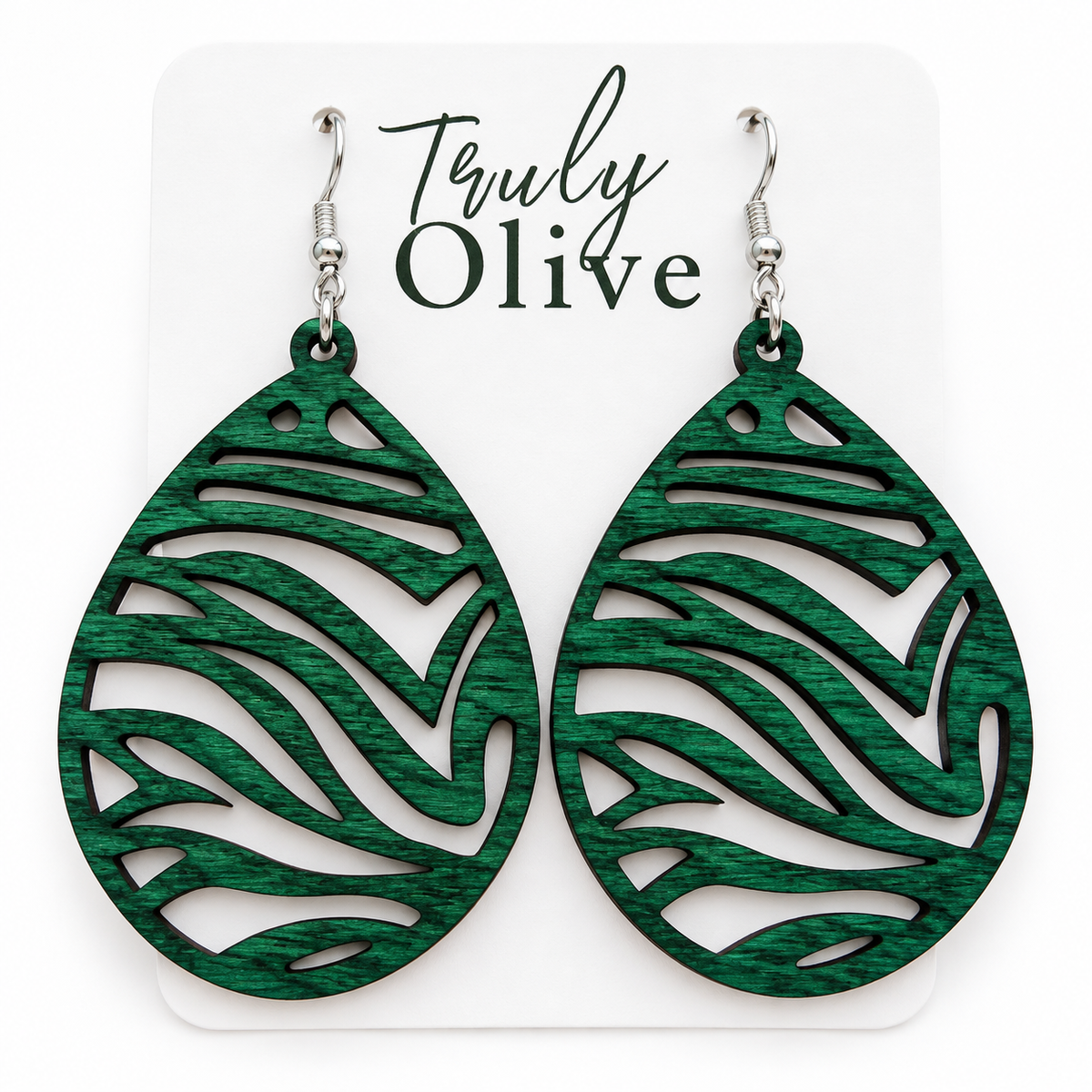Green stained wood teardrop earrings with dark grain and zebra-inspired cutouts on a white Truly Olive card.