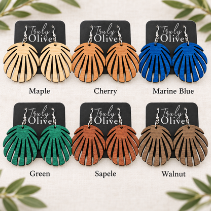 Six pairs of split-leaf earrings labeled Maple, Cherry, Marine Blue, Green, Sapele, and Walnut.