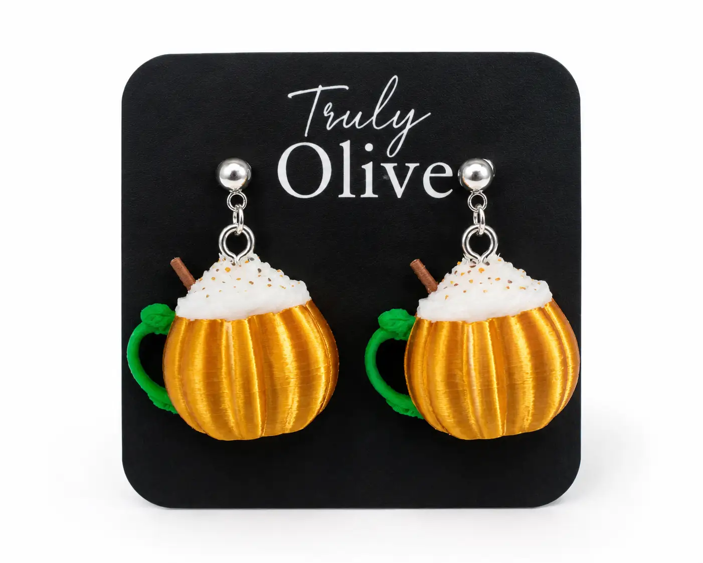 Handcrafted pumpkin spice mug earrings by Truly Olive featuring a pumpkin-shaped coffee cup with whipped cream and cinnamon stick, lightweight fall statement earrings on a white background.