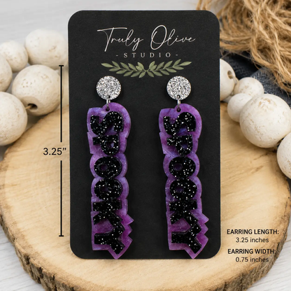 Size guide showing long SPOOKY Halloween earrings measuring approximately 3.25 inches long and 0.75 inches wide.
