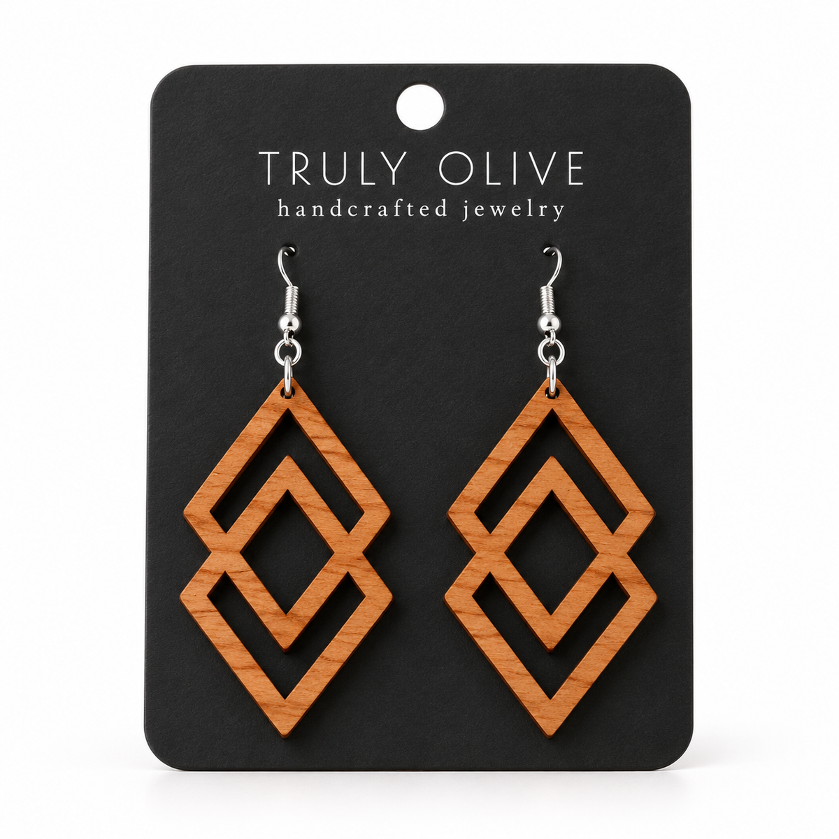 Connected Diamond wood earrings in Cherry stain on a black Truly Olive card.