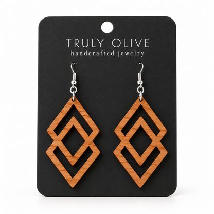 Connected Diamond wood earrings in Cherry stain on a black Truly Olive card.