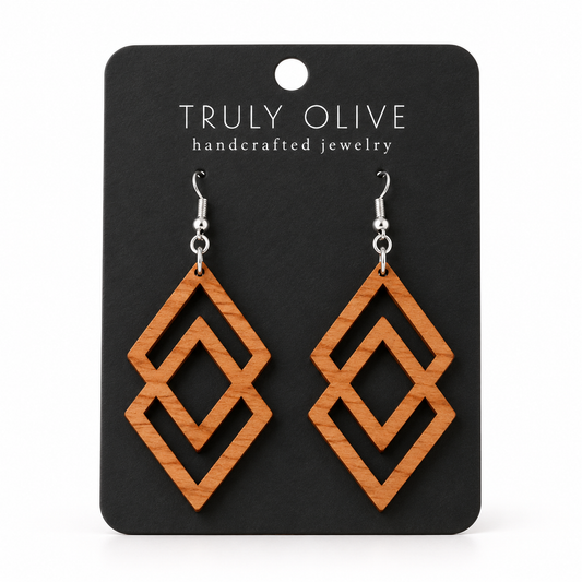 Connected Diamond wood earrings in Cherry stain on a black Truly Olive card.
