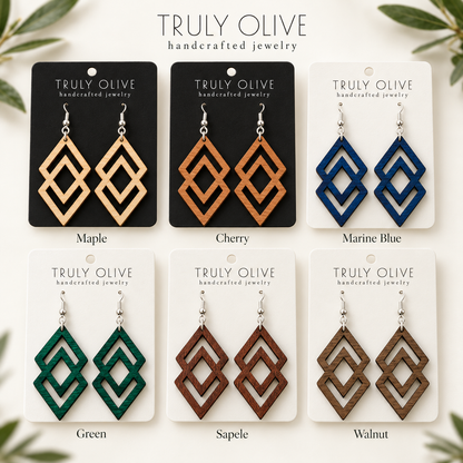 Connected Diamond wood earrings shown in Maple, Cherry, Marine Blue, Green, Sapele, and Walnut stains on Truly Olive cards.
