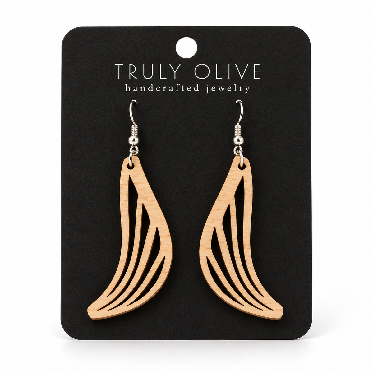 Swept Wing wood earrings in Maple stain on a black Truly Olive card.