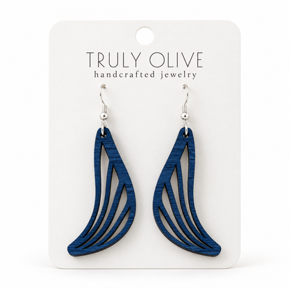 Swept Wing wood earrings in Marine Blue stain on a white Truly Olive card.