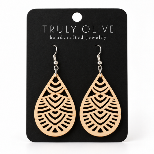 Geometric Teardrop wood earrings in Maple stain on a black Truly Olive card.