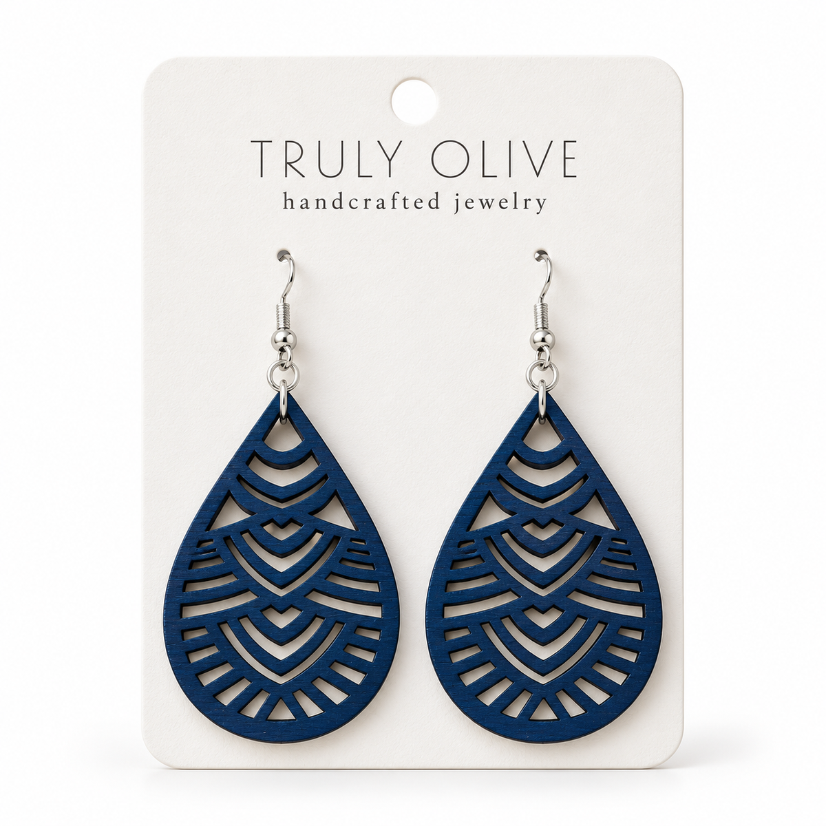 Geometric Teardrop wood earrings in Marine Blue stain on a white Truly Olive card.