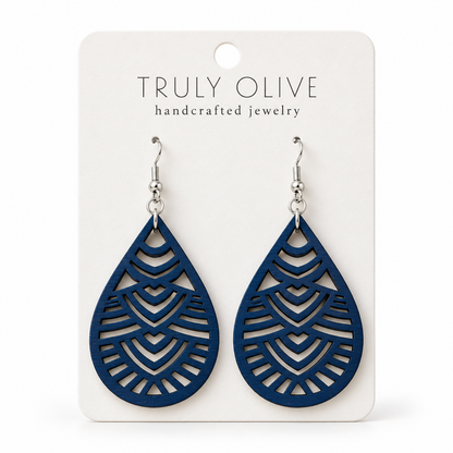Geometric Teardrop wood earrings in Marine Blue stain on a white Truly Olive card.