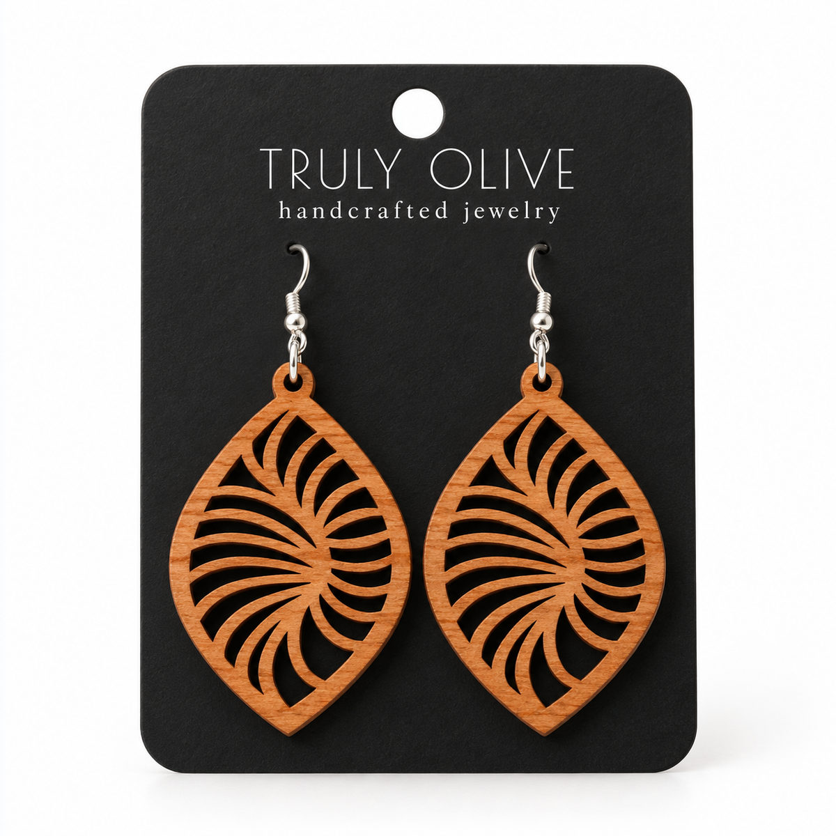 Spiral Leaf wood earrings in Cherry stain on a black Truly Olive card.