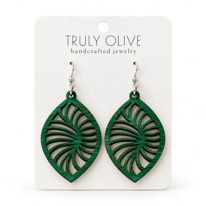 Spiral Leaf wood earrings in Green stain on a white Truly Olive card.