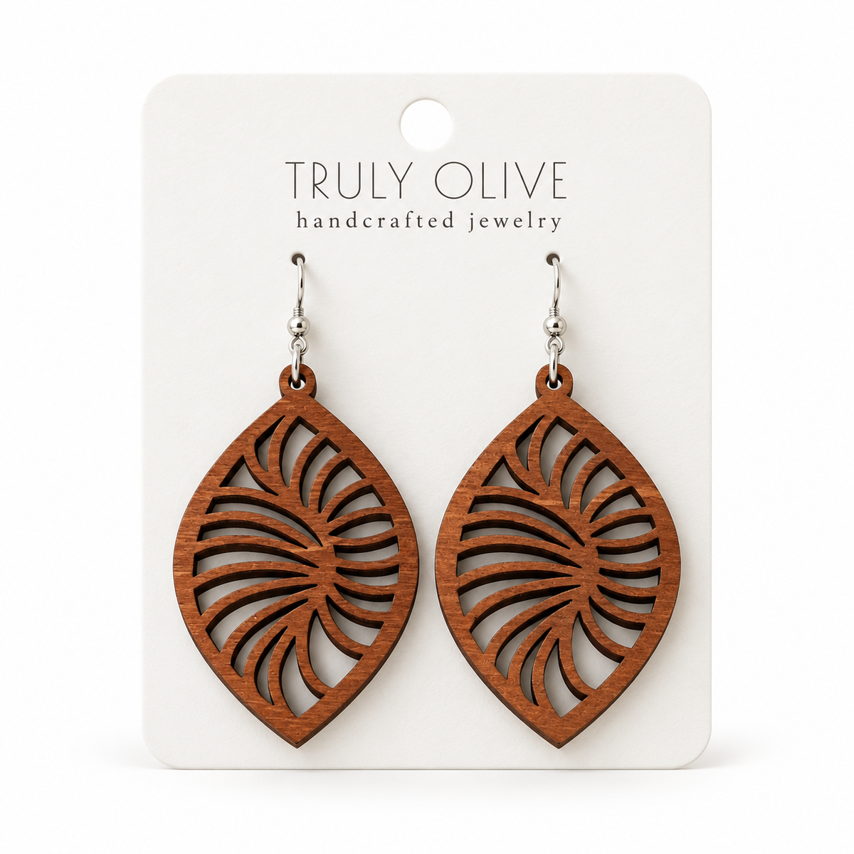 Spiral Leaf wood earrings in Sapele stain on a white Truly Olive card.