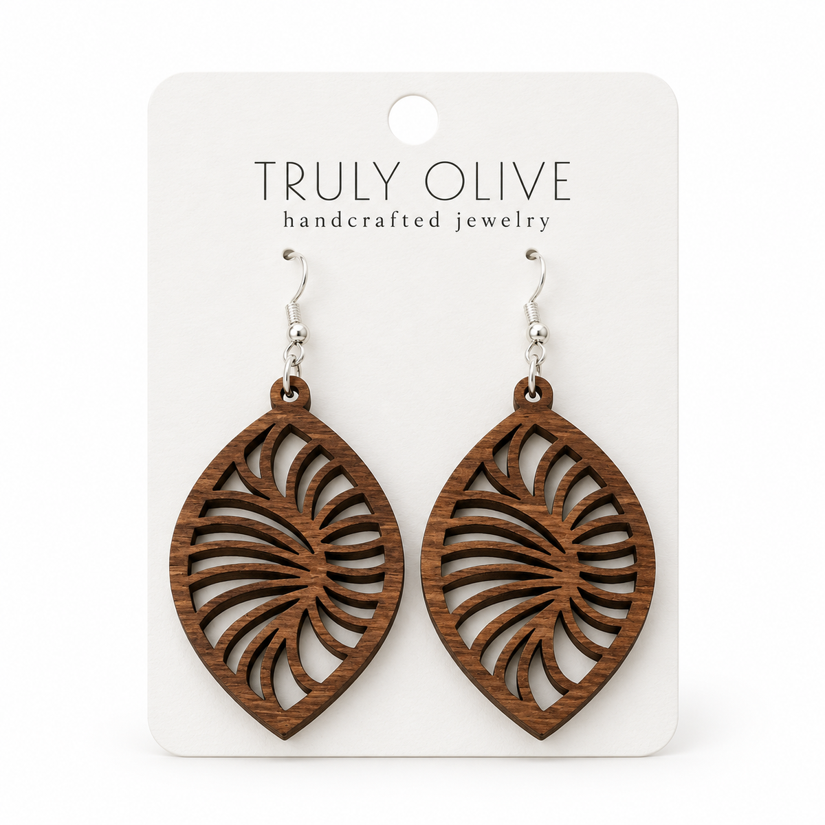 Spiral Leaf wood earrings in Walnut stain on a white Truly Olive card.