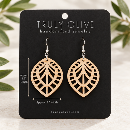 Maple Leaf Lattice wood earrings on a black Truly Olive card with approximate measurements of 1.5 inches long and 1 inch wide.