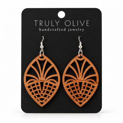 Fan Lattice wood earrings in Cherry stain on a black Truly Olive card.