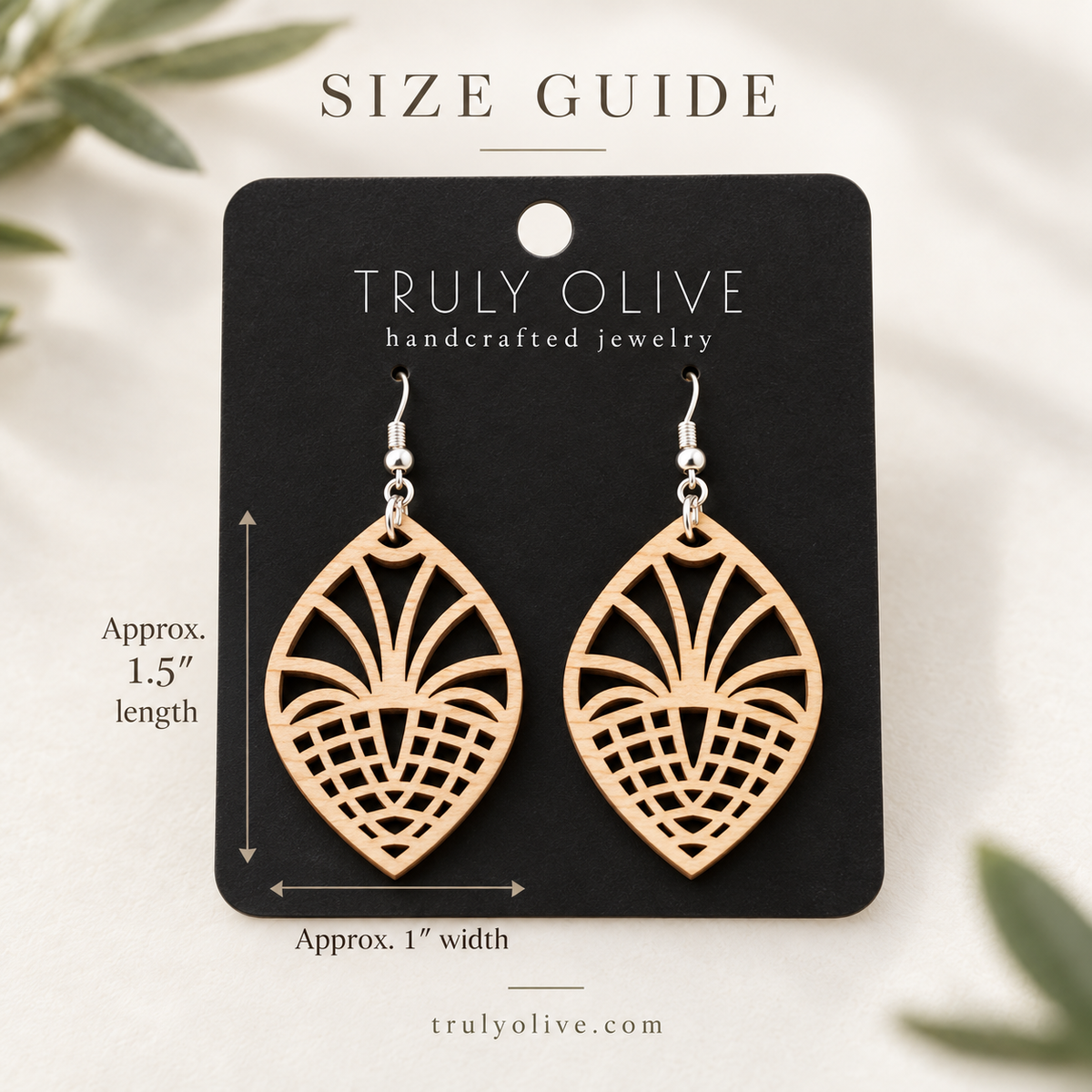 Maple Fan Lattice wood earrings on a black Truly Olive card with approximate measurements of 1.5 inches long and 1 inch wide.