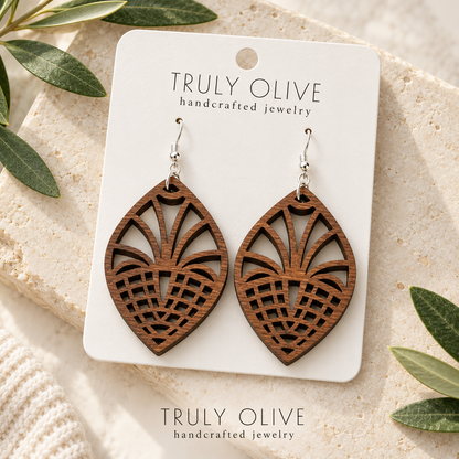 Walnut Fan Lattice wood earrings arranged flat with Truly Olive branding.