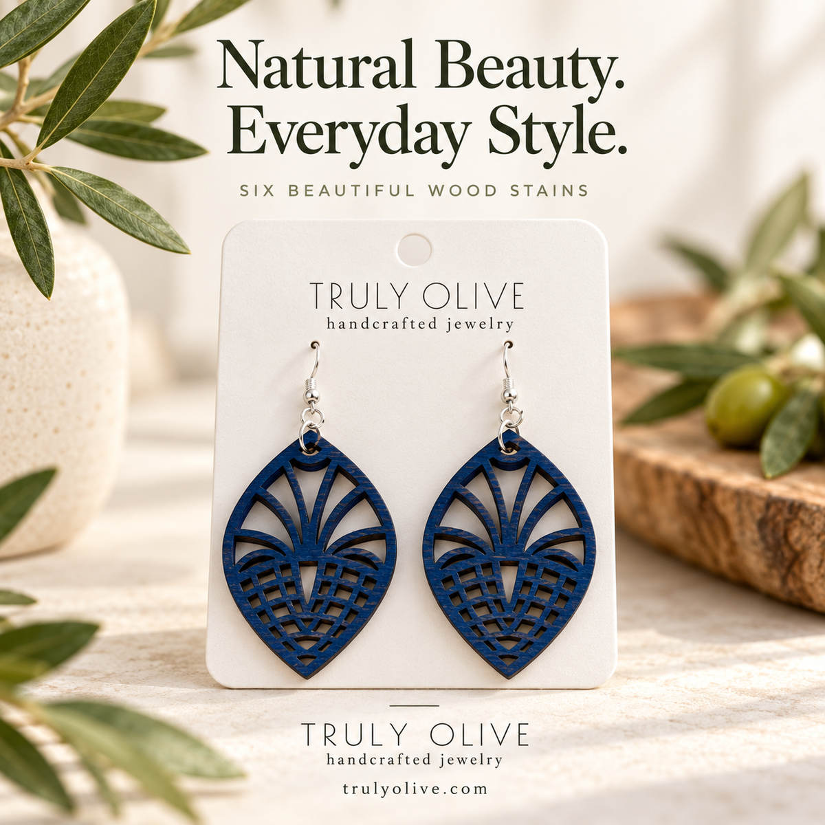 Marine Blue Fan Lattice wood earrings in a styled product image with Truly Olive branding.