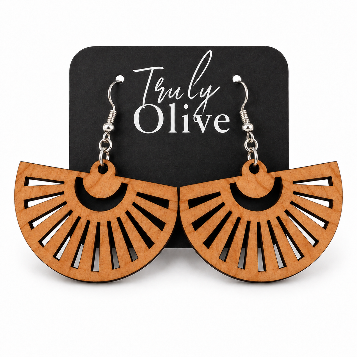 Cherry fan-shaped wood earrings with silver hooks on a black Truly Olive card.