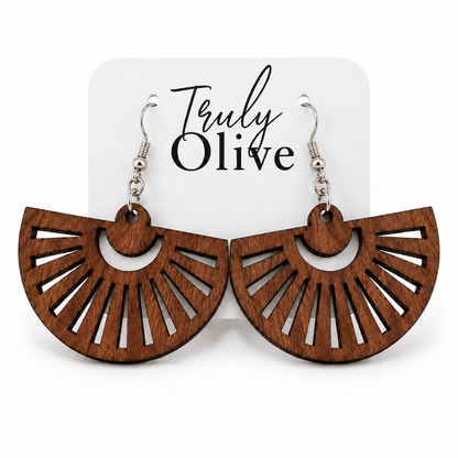 Sapele fan-shaped wood earrings with natural grain on a white Truly Olive card.