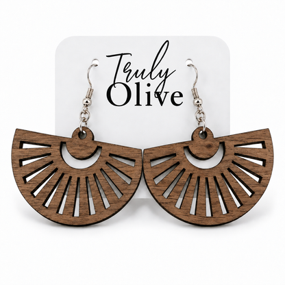 Walnut fan-shaped wood earrings with natural grain on a white Truly Olive card.
