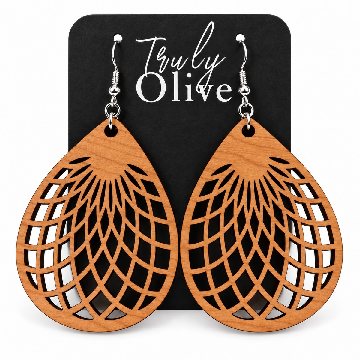 Cherry wooden teardrop earrings with silver hooks on a black Truly Olive card.