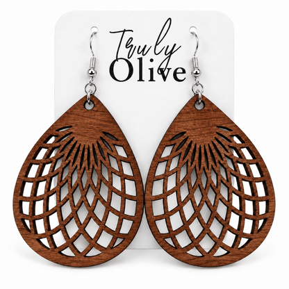 Sapele wooden teardrop earrings showing natural grain on a white Truly Olive card.