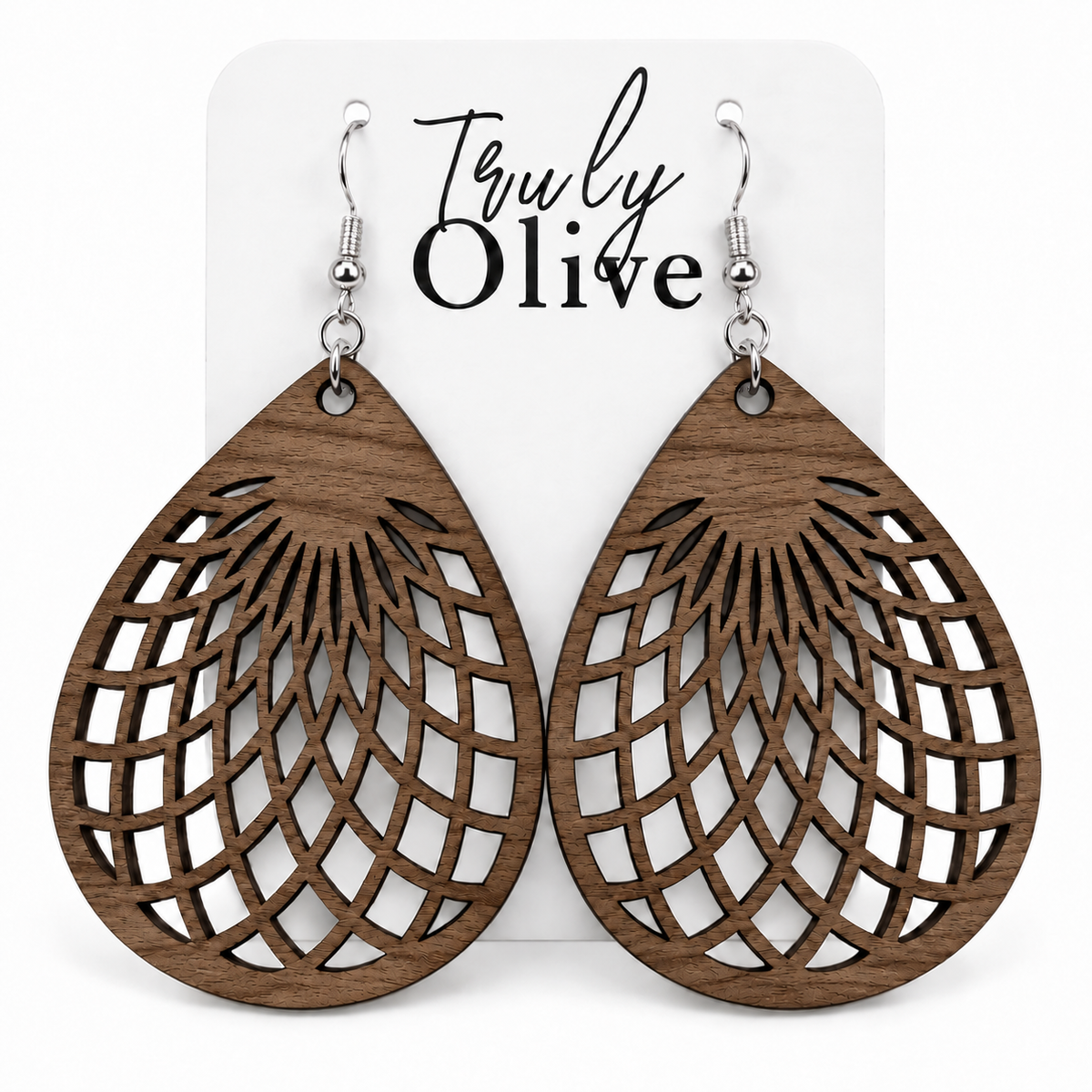 Walnut wooden teardrop earrings with silver hooks on a white Truly Olive card.