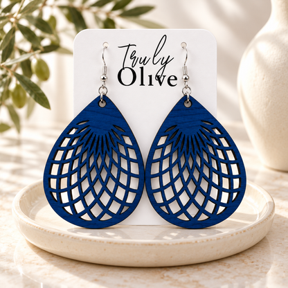 Marine Blue teardrop earrings on a white Truly Olive card in an ivory tray.
