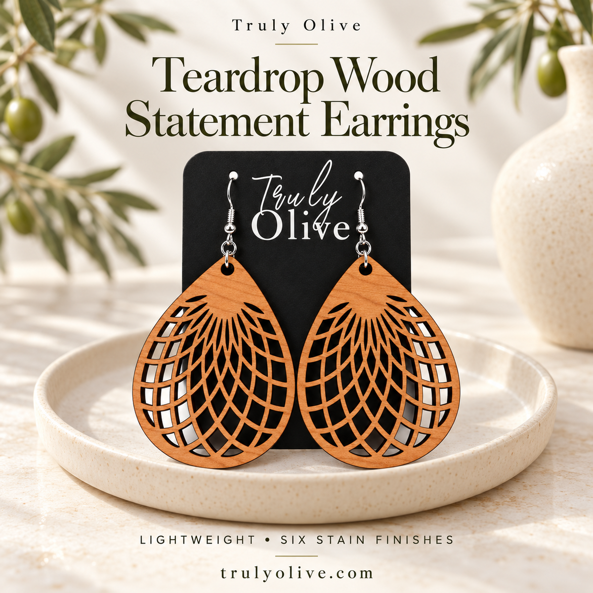 Cherry teardrop earrings with Truly Olive branding and Teardrop Wood Statement Earrings text.